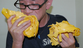 Illustration for article titled A Whopper with 1,000 Slices of Cheese Will Horrify and Disgust You